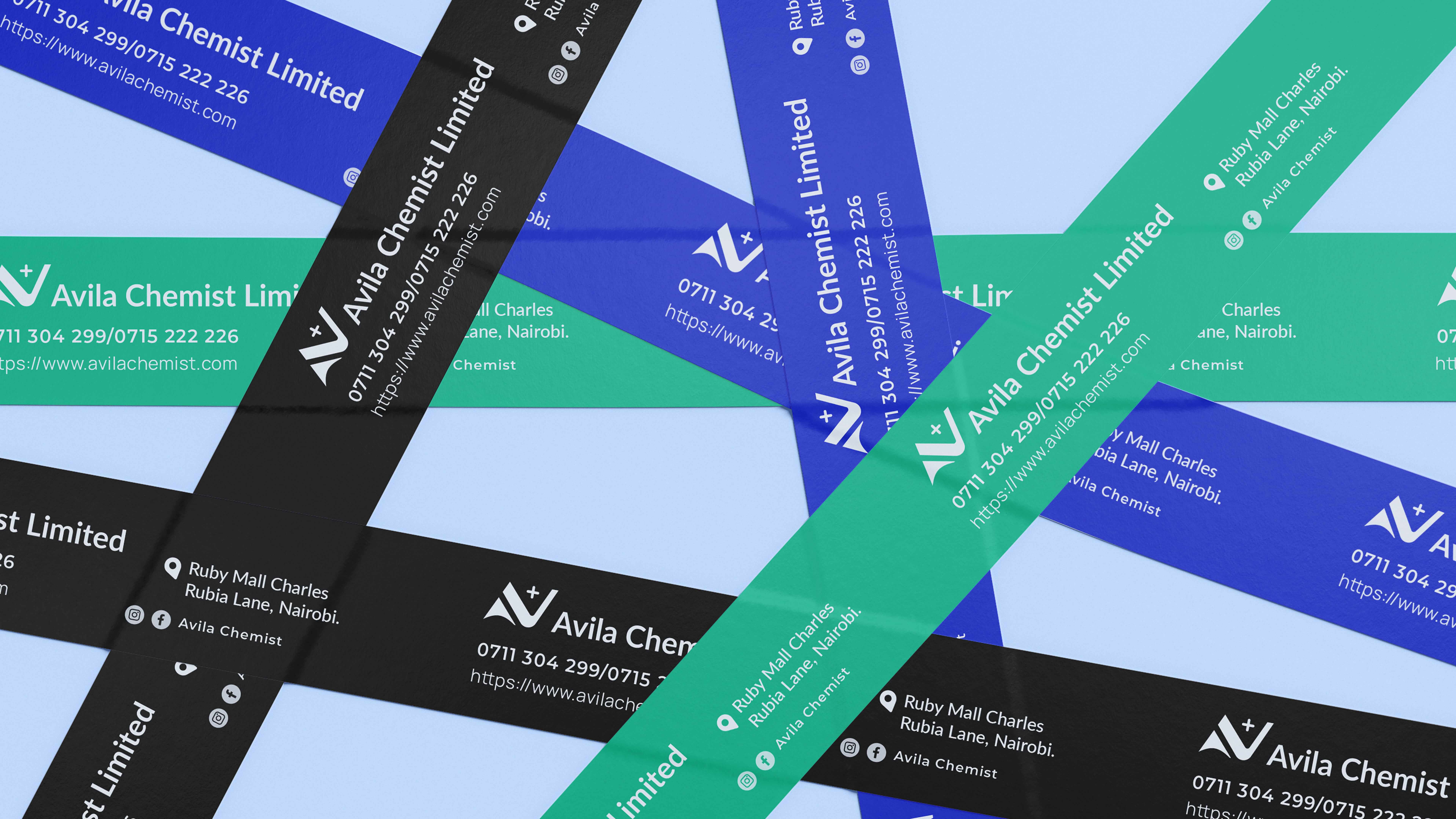 Overlapping black, blue and green Avila Chemist Limited branded tapes with the logo, phone numbers, address and website, on light blue.